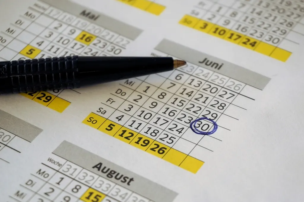 A calendar with a date circled in pen
