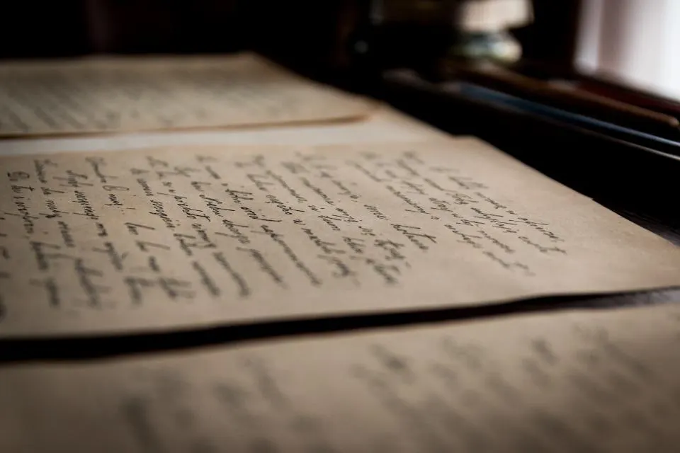 A typed letter lying on a desk
